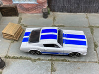 Matchbox 1965 Ford Mustang GT (Fastback) White and Blue loose diecast - side profile detail shot