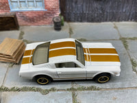 Matchbox 1965 Ford Mustang GT (Fastback) White and Gold loose diecast - side profile detail shot