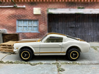 Matchbox 1965 Ford Mustang GT (Fastback) White and Gold - rear angle view showing tampo details