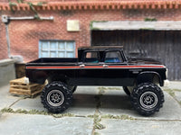 Matchbox 1968 Dodge D200 Off Road 4X4 Truck Black - rear angle view showing tampo details