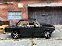 Matchbox 1969 BMW 2002 Black - rear angle view showing tampo details