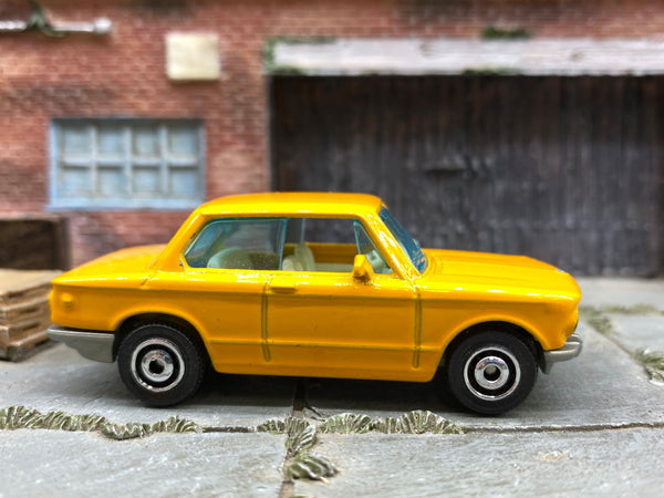 Matchbox 1969 BMW 2002 in Yellow, loose diecast car