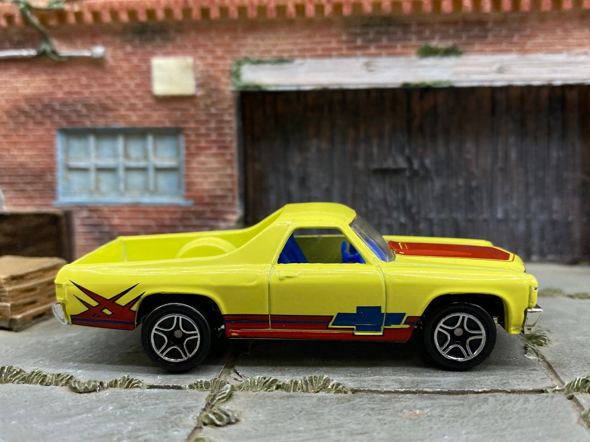 Matchbox 1970 Chevy El Camino in Yellow and Burgundy, loose diecast car