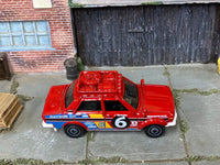 Matchbox 1970 Datsun 510 Rally Car Red loose diecast - side profile detail shot