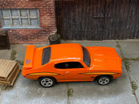 Matchbox 1970 Pontiac GTO Orange The Judge loose diecast - side profile detail shot
