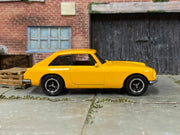 Matchbox 1971 MGB GT Coupe Yellow - rear angle view showing tampo details
