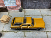Matchbox 1971 Oldsmobile Vista Cruiser Brown loose diecast - side profile detail shot