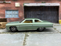 Loose Matchbox 1975 Chevrolet Caprice Classic in Green - front three-quarter view 1:64 scale diecast