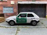 Matchbox 1976 VW Volkswagen Golf MK1 White and Green Polizei - rear angle view showing tampo details