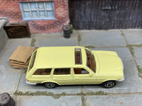 Matchbox 1980 Mercedes-Benz W123 Wagon light yellow loose diecast - gallery image 2 of 3