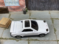 Matchbox 1984 Toyota MR2 White loose diecast - side profile detail shot