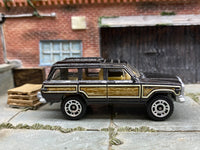 Matchbox 1989 Jeep Wagoneer in Dark Gray, loose diecast car
