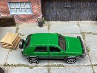 Matchbox 1990 VW Volkswagen Golf Green loose diecast - side profile detail shot