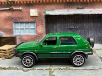 Matchbox 1990 VW Volkswagen Golf Green - rear angle view showing tampo details