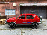 Matchbox 1990 VW Volkswagen Golf Red - rear angle view showing tampo details