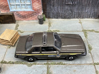 Matchbox 1993 Ford Mustang LX SSP Coupe Brown and Black Boone County Sheriff loose diecast - side profile detail shot