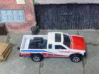 Matchbox 1995 Nissan Hardbody 4X4 Off Road Truck White, Red and Blue loose diecast - side profile detail shot
