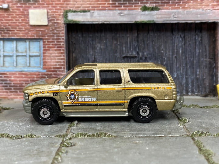 Matchbox 2000 Chevy Suburban in Gold Boone County Sheriff, loose diecast car