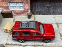 Matchbox 2000 Nissan XTerra Red loose diecast - side profile detail shot