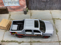 Matchbox 2007 Honda Ridgeline Silver 71 - rear angle view showing tampo details