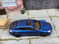 Matchbox 2010 Porsche Panamera Blue loose diecast - side profile detail shot