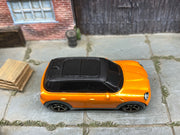 Matchbox 2011 Mini Cooper Countryman orange loose diecast - gallery image 2 of 3