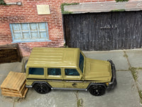 Matchbox 2014 Mercedes Benz G-Class Off Road Jurassic Park Brown loose diecast - side profile detail shot