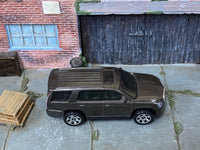 Matchbox 2015 Cadillac Escalade Dark Gray loose diecast - side profile detail shot