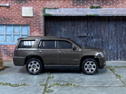 Matchbox 2015 Cadillac Escalade Dark Gray - rear angle view showing tampo details
