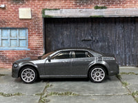 Matchbox 2015 Chrysler 300 Dark Gray - rear angle view showing tampo details