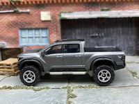 Matchbox 2016 Nissan Titan Warrior Gray - rear angle view showing tampo details