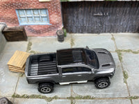 Matchbox 2016 Nissan Titan Warrior Gray loose diecast - side profile detail shot