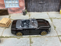 Matchbox 2018 Ford Mustang Convertible Black - rear angle view showing tampo details
