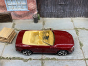 Matchbox 2018 Ford Mustang Convertible Dark Red and Tan loose diecast - side profile detail shot