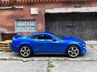 Matchbox 2019 Ford Mustang Coupe Dark Blue - rear angle view showing tampo details