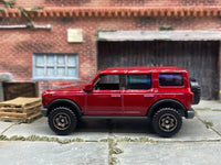 Matchbox 2021 Ford Bronco 4X4 Dark Red - rear angle view showing tampo details