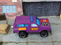 Matchbox 4X4 Chevy Blazer Purple and Orange loose diecast - side profile detail shot
