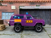Matchbox 4X4 Chevy Blazer Purple and Orange - rear angle view showing tampo details