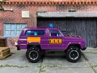Matchbox 4X4 Chevy Blazer Purple and Orange - rear angle view showing tampo details