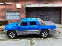 Matchbox Chevrolet Avalanche Blue and Gray - rear angle view showing tampo details