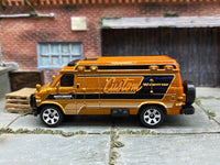 Matchbox Custom 1995 Chevy Van Brown - rear angle view showing tampo details