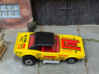Matchbox Dodge Challenger (1975) Yellow and Red loose diecast - side profile detail shot