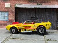 Matchbox Dodge Challenger (1975) Yellow and Red - rear angle view showing tampo details
