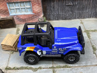 Matchbox Jeep 4X4 Blue, Orange and Yellow 1 loose diecast - side profile detail shot