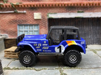 Matchbox Jeep 4X4 Blue, Orange and Yellow 1 - rear angle view showing tampo details