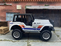 Matchbox Jeep CJ-7 4X4 White, Red and Blue - rear angle view showing tampo details