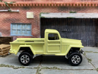 Matchbox 1951 Jeep Willys 4X4 Light Yellow - rear angle view showing tampo details