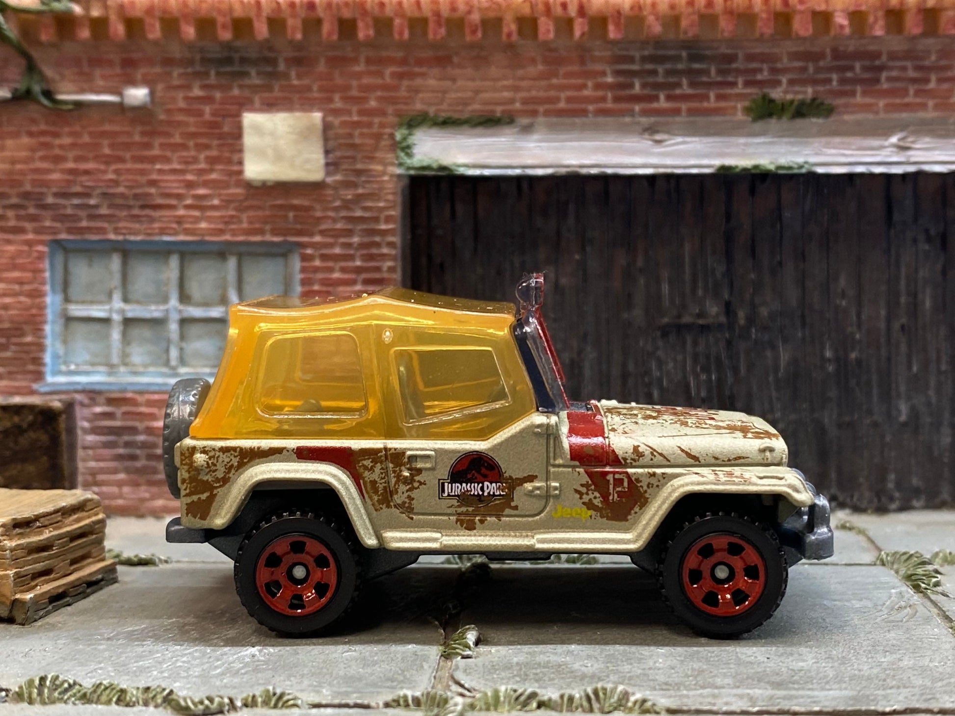 Loose Matchbox - Jeep Wrangler Jurassic Park Tour Jeep - Gold and Red with Yellow Top