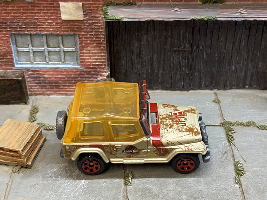 Loose Matchbox - Jeep Wrangler Jurassic Park Tour Jeep - Gold and Red with Yellow Top