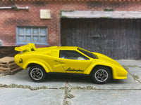 Matchbox Lamborghini Countach LP 500s Yellow - rear angle view showing tampo details